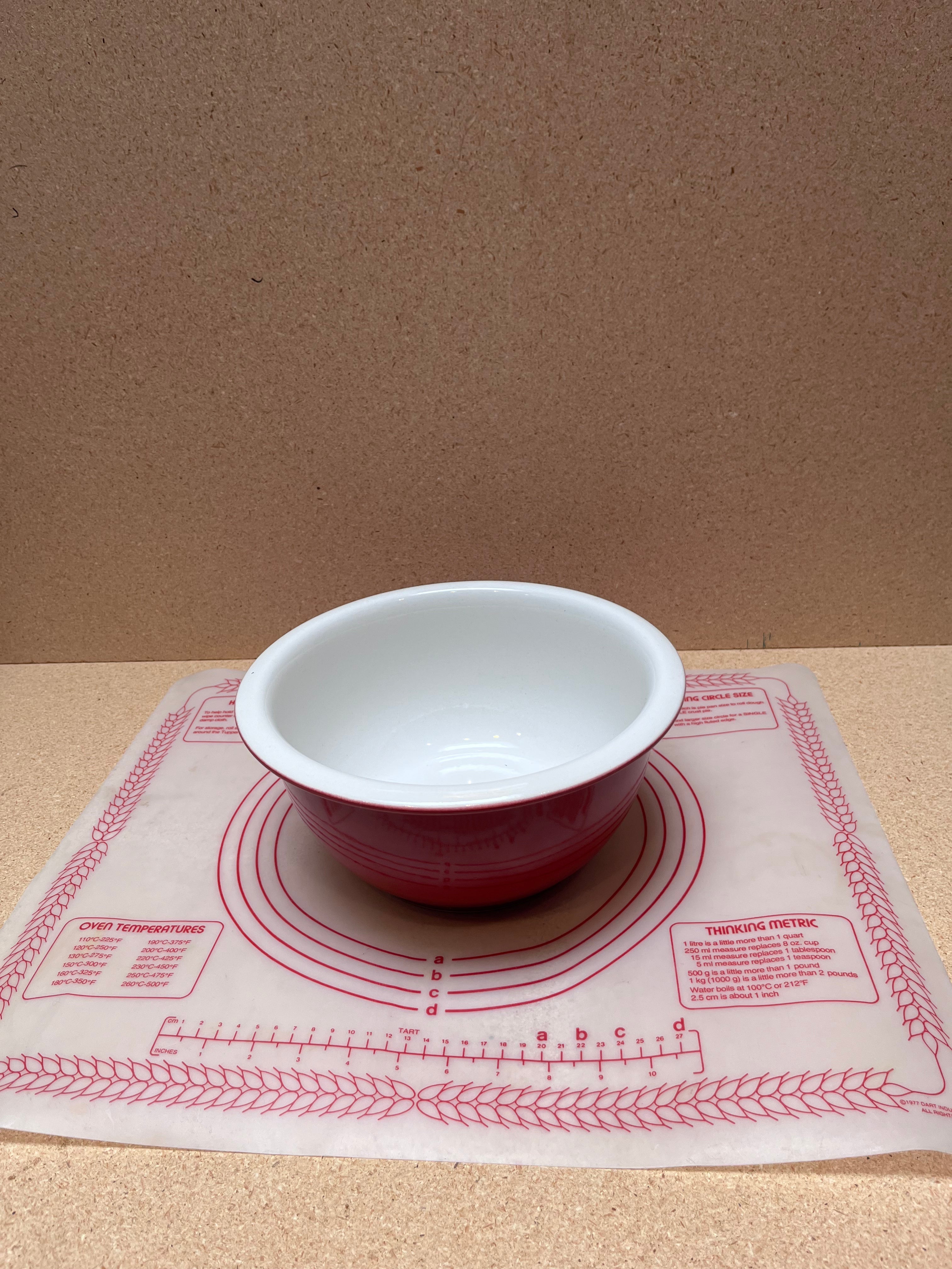 Lot #38 - Pastry mat and red mixing bowl